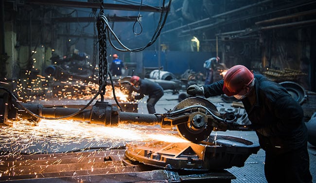 Metal industry process with sparks, emphasizing safety solutions